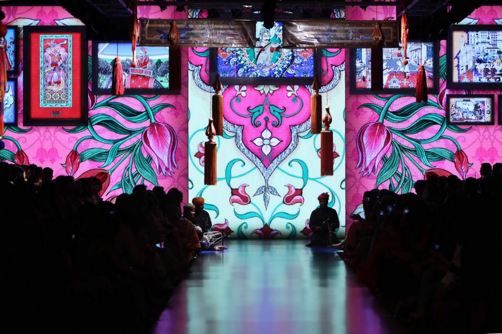 The Singh Twins paintings in the backdrop for Tarun Tahiliani's show Photo Courtesy: Lakme Fashion Week