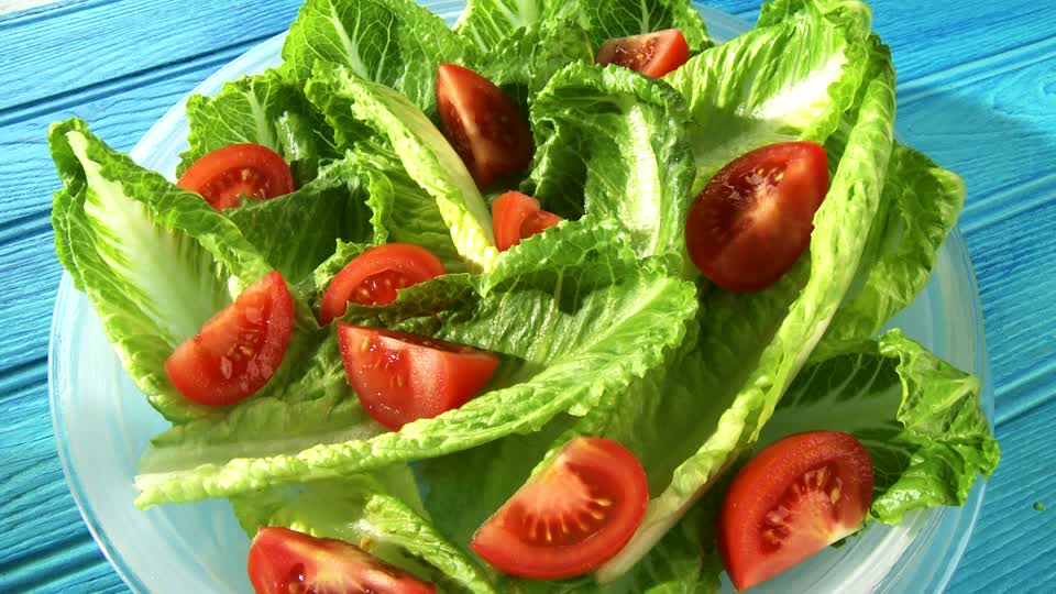 985607215-romaine-lettuce-salad-dish-hotness-food-tomato-vegetables